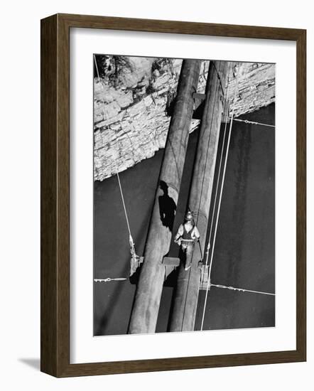 Worker Walking on the Texas Illinois Natural Gas Company's Pipeline Suspension Bridge-John Dominis-Framed Photographic Print