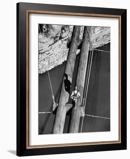 Worker Walking on the Texas Illinois Natural Gas Company's Pipeline Suspension Bridge-John Dominis-Framed Photographic Print