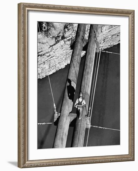 Worker Walking on the Texas Illinois Natural Gas Company's Pipeline Suspension Bridge-John Dominis-Framed Photographic Print