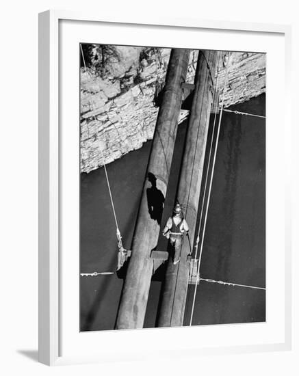 Worker Walking on the Texas Illinois Natural Gas Company's Pipeline Suspension Bridge-John Dominis-Framed Photographic Print