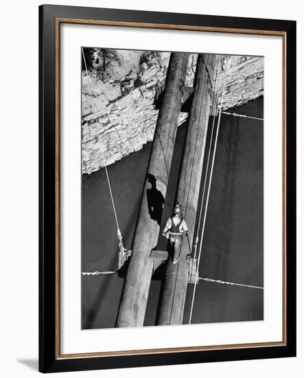 Worker Walking on the Texas Illinois Natural Gas Company's Pipeline Suspension Bridge-John Dominis-Framed Photographic Print