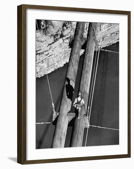 Worker Walking on the Texas Illinois Natural Gas Company's Pipeline Suspension Bridge-John Dominis-Framed Photographic Print