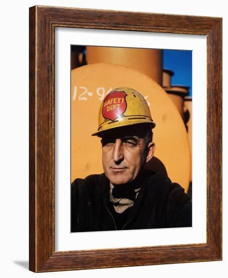 Worker Wearing Safety Helmet Outside at Sun Shipbuilding and Dry Dock Co. Shipyards-Dmitri Kessel-Framed Photographic Print