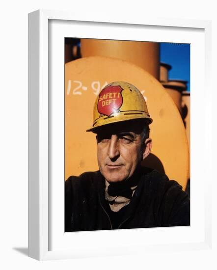 Worker Wearing Safety Helmet Outside at Sun Shipbuilding and Dry Dock Co. Shipyards-Dmitri Kessel-Framed Photographic Print