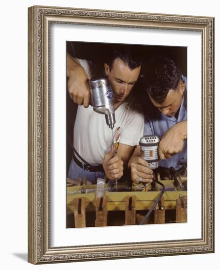 Workers Assembling Parts For a Consolidated Aircraft-Dmitri Kessel-Framed Photographic Print