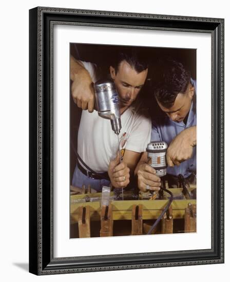 Workers Assembling Parts For a Consolidated Aircraft-Dmitri Kessel-Framed Photographic Print