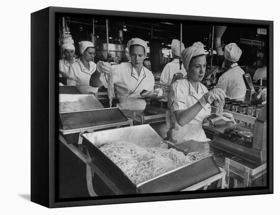 Workers at Ann Page Plant Transferring Spaghetti from Bins into Rows of Cans-null-Framed Premier Image Canvas