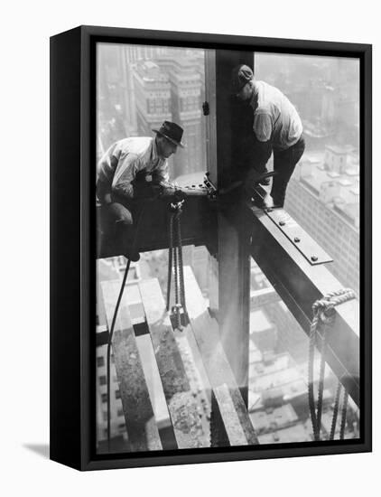 Workers balancing on steel beam above streets during construction of the Manhattan Company Building-Arthur Gerlach-Framed Premier Image Canvas