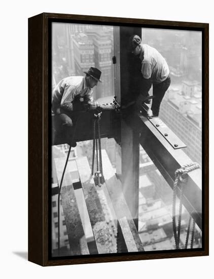 Workers balancing on steel beam above streets during construction of the Manhattan Company Building-Arthur Gerlach-Framed Premier Image Canvas