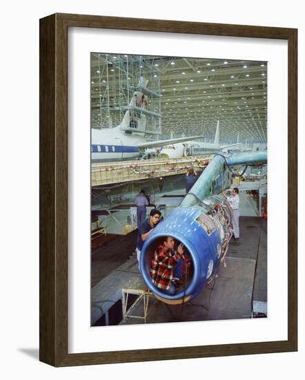 Workers Building the Engine of a DC-8 Passenger Jet at the Douglas Aircraft Plant-Ralph Crane-Framed Photographic Print