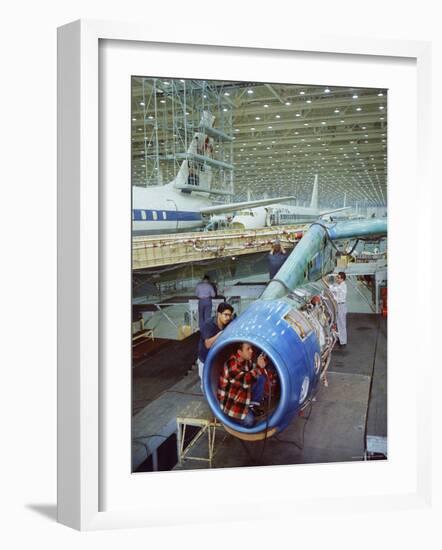 Workers Building the Engine of a DC-8 Passenger Jet at the Douglas Aircraft Plant-Ralph Crane-Framed Photographic Print