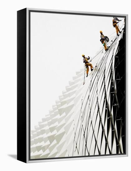 Workers Climb Down the Roof of Singapore's Spikey Fruit Shaped Esplanade Arts Center-null-Framed Premier Image Canvas