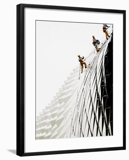 Workers Climb Down the Roof of Singapore's Spikey Fruit Shaped Esplanade Arts Center-null-Framed Photographic Print