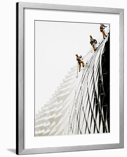 Workers Climb Down the Roof of Singapore's Spikey Fruit Shaped Esplanade Arts Center-null-Framed Photographic Print