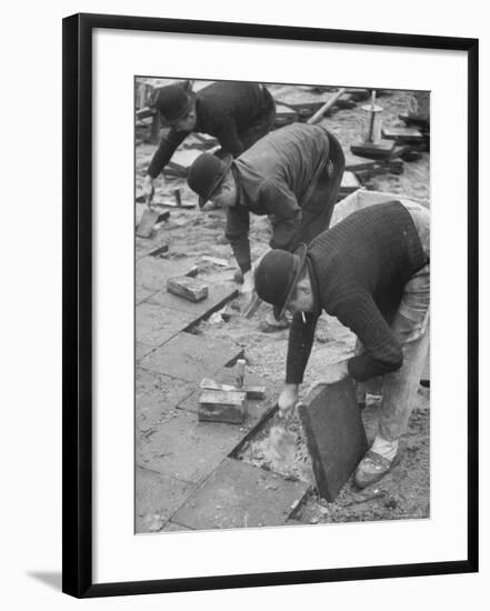 Workers Paving Sidewalk in Front of Stalin Statue Are Making Highest Salaries at 24 Cents Per Hour-Ralph Crane-Framed Photographic Print