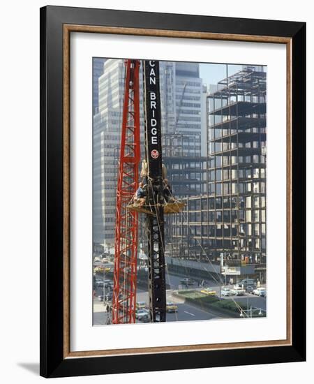 Workers Service Crane Across Street from National Bank Building under Construction on Park Ave-Dmitri Kessel-Framed Photographic Print