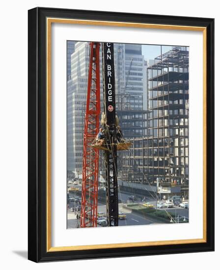 Workers Service Crane Across Street from National Bank Building under Construction on Park Ave-Dmitri Kessel-Framed Photographic Print