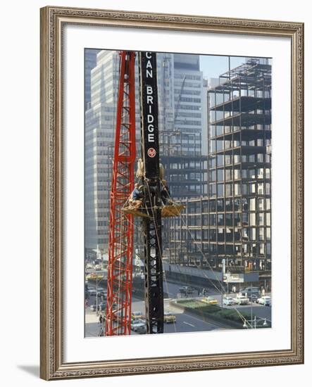 Workers Service Crane Across Street from National Bank Building under Construction on Park Ave-Dmitri Kessel-Framed Photographic Print