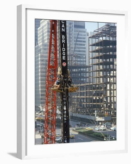 Workers Service Crane Across Street from National Bank Building under Construction on Park Ave-Dmitri Kessel-Framed Photographic Print