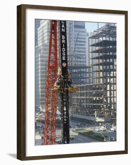 Workers Service Crane Across Street from National Bank Building under Construction on Park Ave-Dmitri Kessel-Framed Photographic Print