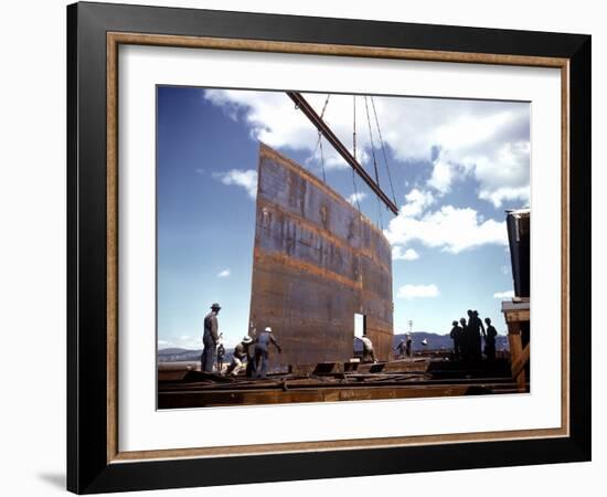 Workers Watching as Steel Beam is Raised High Above During Sub Assembling of Ship at Shipyard-Hansel Mieth-Framed Photographic Print