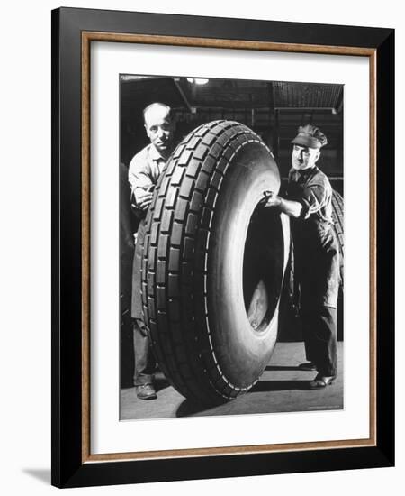 Workers with Truck Tires at Us Rubber Plant-Andreas Feininger-Framed Photographic Print