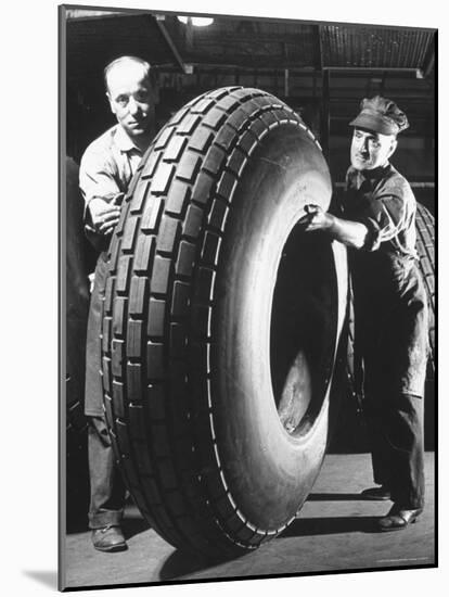 Workers with Truck Tires at Us Rubber Plant-Andreas Feininger-Mounted Photographic Print