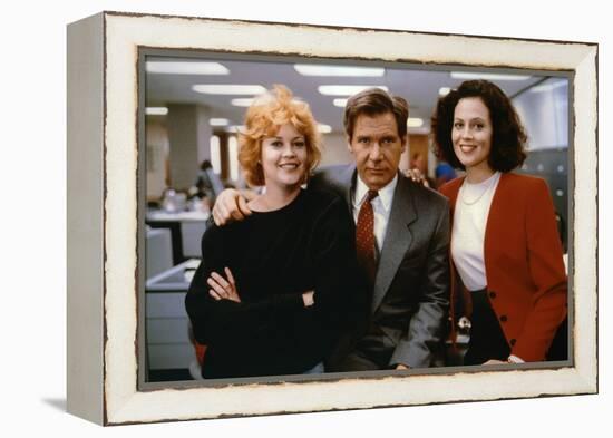 Working Girl by MikeNichols with Harrison Ford Melanie Griffith and Sigourney Weaver, 1988 (photo)-null-Framed Stretched Canvas