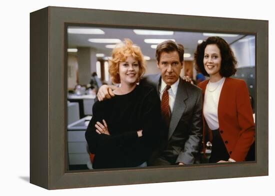 Working Girl by MikeNichols with Harrison Ford Melanie Griffith and Sigourney Weaver, 1988 (photo)-null-Framed Stretched Canvas