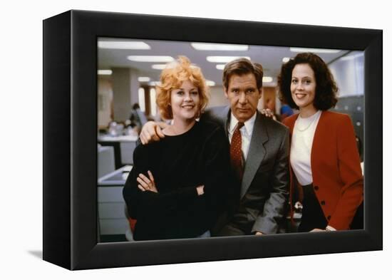 Working Girl by MikeNichols with Harrison Ford Melanie Griffith and Sigourney Weaver, 1988 (photo)-null-Framed Stretched Canvas