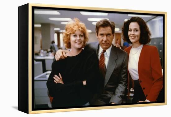 Working Girl by MikeNichols with Harrison Ford Melanie Griffith and Sigourney Weaver, 1988 (photo)-null-Framed Stretched Canvas