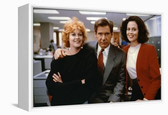 Working Girl by MikeNichols with Harrison Ford Melanie Griffith and Sigourney Weaver, 1988 (photo)-null-Framed Stretched Canvas