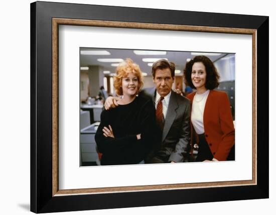 Working Girl by MikeNichols with Harrison Ford Melanie Griffith and Sigourney Weaver, 1988 (photo)-null-Framed Photo