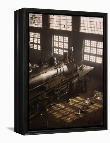 Working on a locomotive at the 40th Street railroad shops, Chicago, 1942-Jack Delano-Framed Premier Image Canvas