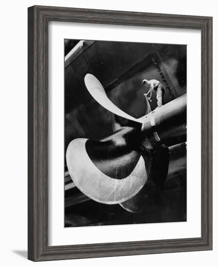 Workman Checking Out One of the Newly Constructed 34 Ton Propellers-Alfred Eisenstaedt-Framed Photographic Print