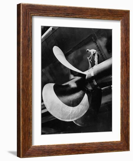 Workman Checking Out One of the Newly Constructed 34 Ton Propellers-Alfred Eisenstaedt-Framed Photographic Print