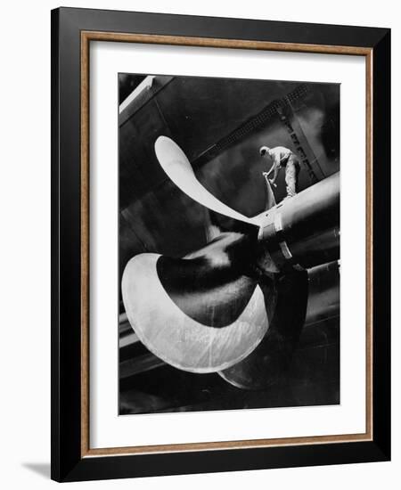 Workman Checking Out One of the Newly Constructed 34 Ton Propellers-Alfred Eisenstaedt-Framed Photographic Print