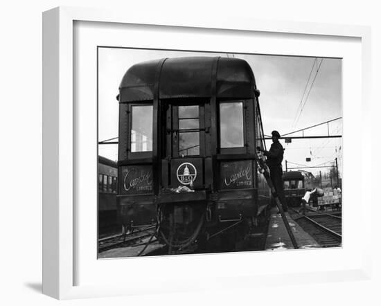 Workman Cleaning Car of the "Capitol Limited" in Yard at Union Station-Alfred Eisenstaedt-Framed Photographic Print