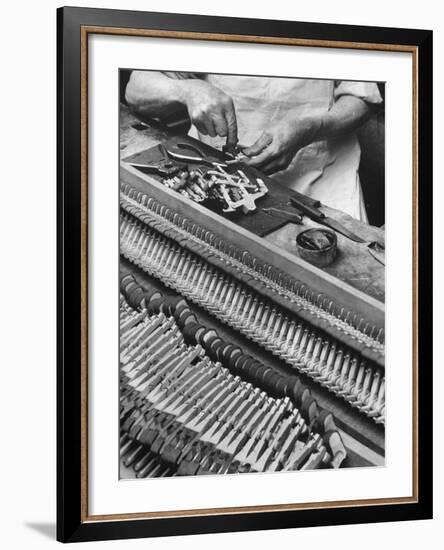 Workman Installing Some of the Whippens, Shanks and Hammers at the Steinway Piano Factory-Margaret Bourke-White-Framed Premium Photographic Print