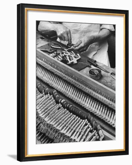 Workman Installing Some of the Whippens, Shanks and Hammers at the Steinway Piano Factory-Margaret Bourke-White-Framed Premium Photographic Print