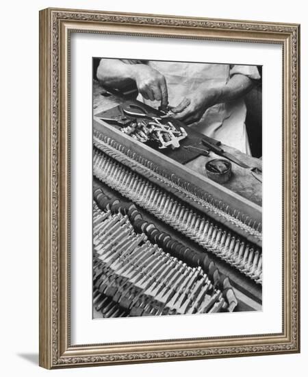 Workman Installing Some of the Whippens, Shanks and Hammers at the Steinway Piano Factory-Margaret Bourke-White-Framed Photographic Print