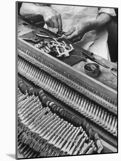 Workman Installing Some of the Whippens, Shanks and Hammers at the Steinway Piano Factory-Margaret Bourke-White-Mounted Photographic Print