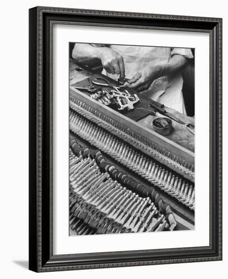 Workman Installing Some of the Whippens, Shanks and Hammers at the Steinway Piano Factory-Margaret Bourke-White-Framed Photographic Print