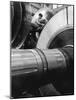 Workman on Large Wheel That Looks Like Fan, at General Electric Laboratory-Alfred Eisenstaedt-Mounted Photographic Print