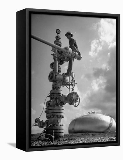 Workman Standing on Machinery at Natural Gas Plant-Thomas D^ Mcavoy-Framed Premier Image Canvas