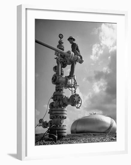 Workman Standing on Machinery at Natural Gas Plant-Thomas D^ Mcavoy-Framed Photographic Print