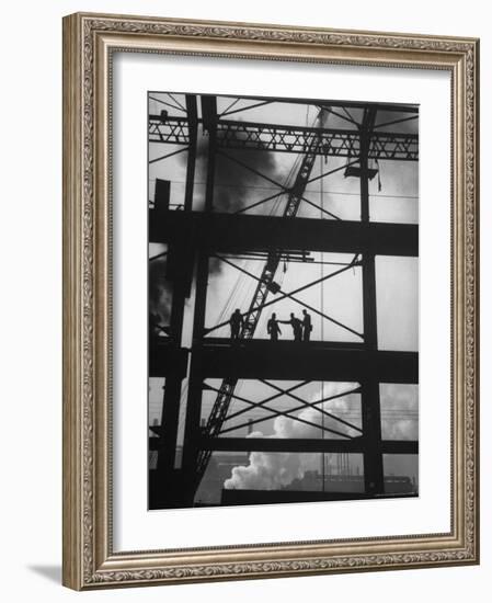 Workmen Against Smokey Sky as They Stand on Girders of the New Carnegie Illinois Steel Plant-Margaret Bourke-White-Framed Photographic Print