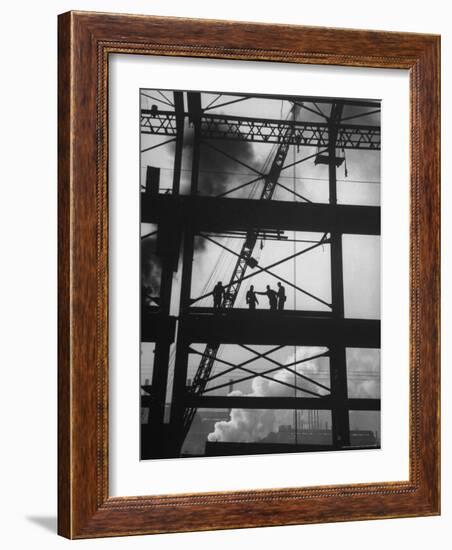 Workmen Against Smokey Sky as They Stand on Girders of the New Carnegie Illinois Steel Plant-Margaret Bourke-White-Framed Photographic Print