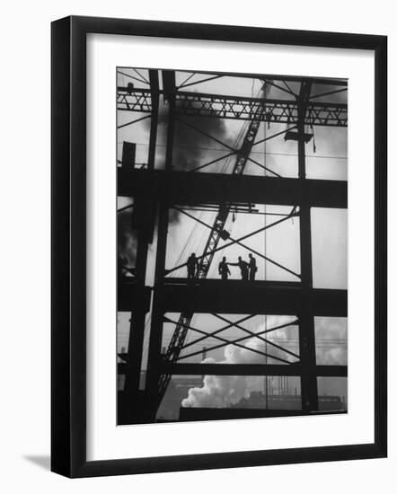 Workmen Against Smokey Sky as They Stand on Girders of the New Carnegie Illinois Steel Plant-Margaret Bourke-White-Framed Photographic Print