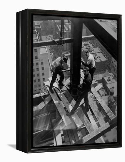 Workmen Attach Steel Beams Above Street During Construction of the Manhattan Company Building-Arthur Gerlach-Framed Premier Image Canvas